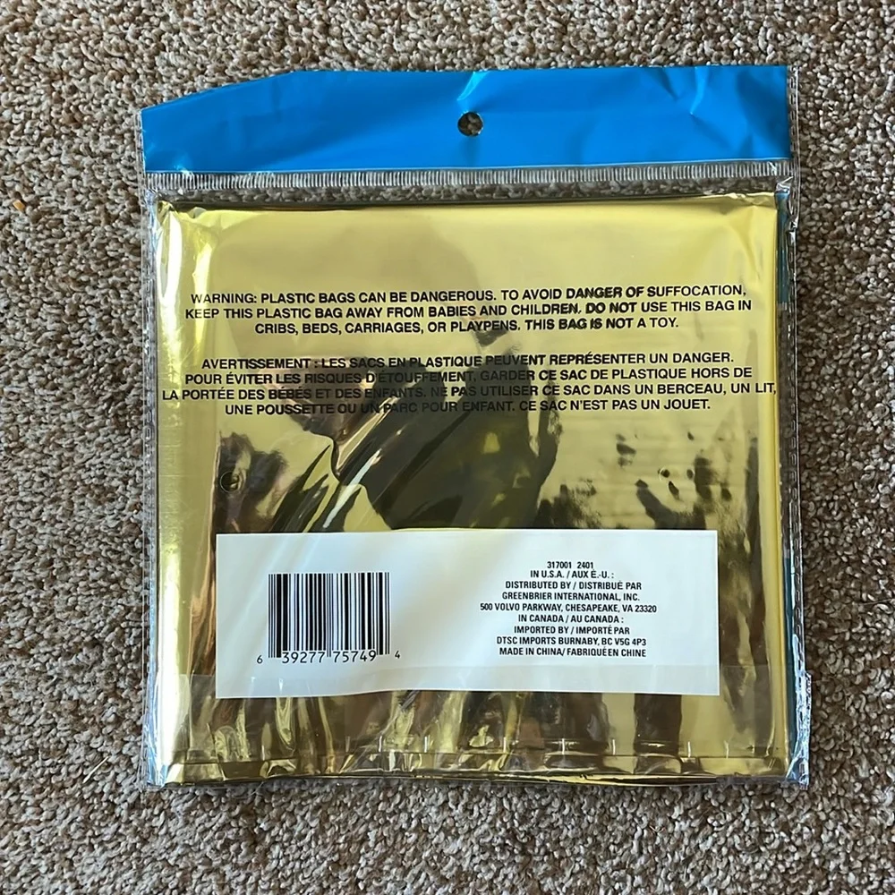 Rectangle gold plastic table cover 54” X 108”